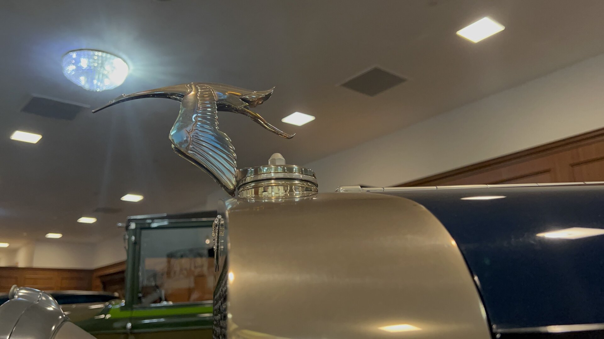 Hispano-Suiza stork mascot inside the Nethercutt Grand Salon, photographed first-hand by Omar Mukhtar.